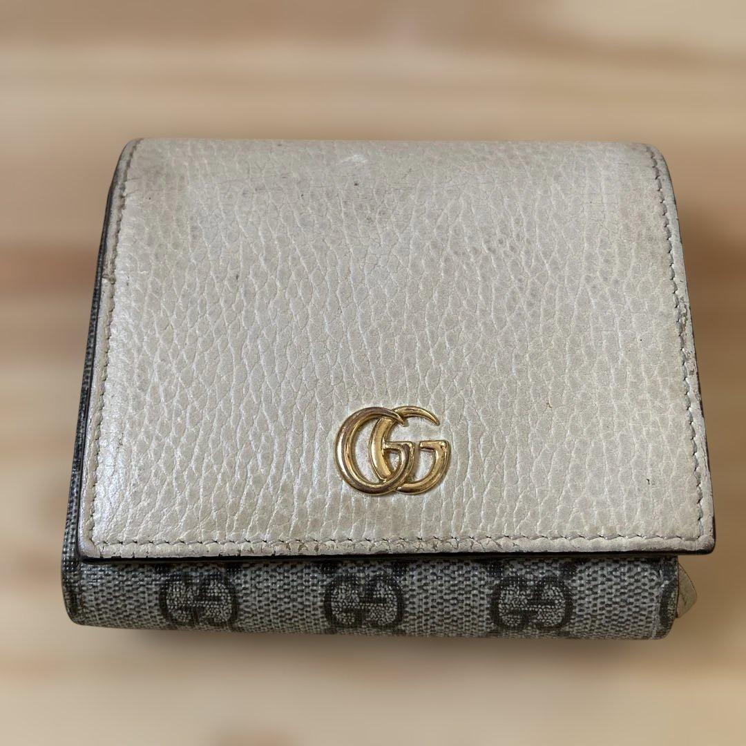 GUCCI 二つ折り財布 ベージュ GGロゴ